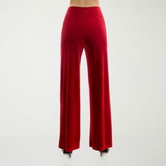 With their smooth, velvety texture and flowing wide-leg silhouette, these rich red women's pull-on pants from Premier Amour add a glam touch to your wardrobe. They're made from stretch fabric ensuring comfortable wear and have a flat front and a flattering mid-rise. Wear yours with a crop top and heels. Front Style: Flat FrontFeatures: Stretch FabricClosure Type: Pull OnFit: Loose FitRise: Mid RiseFiber Content: 95% Polyester, 5% SpandexFabric Description: VelvetLining: UnlinedInseam: 32 InLeg … Velvet Wide Leg Full Length Party Pants, Velvet Wide Leg Pants For Party, Velvet Full Length Wide Leg Party Pants, Elegant High-waisted Velvet Pants, Elegant Wide Leg Velvet Bottoms, Velvet Full Length Bottoms For Evening, Red Wide-leg Evening Pants, Red Wide-leg Pants For Evening, Red Wide Leg Bottoms For Evening