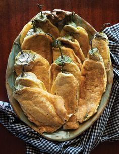 a dish filled with bread on top of a wooden table