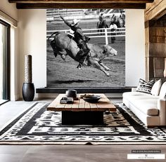 a living room filled with furniture and a cowgirl on the back of a bucking horse