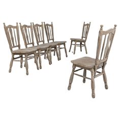 a set of six wooden dining chairs