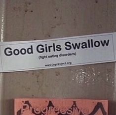 some stickers that are on the side of a door with words good girls swallow