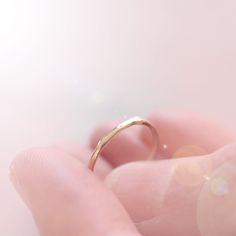 Introducing the original Dainty Ring - a must-have for every ring stack! Made from 14k yellow gold, this ring is both delicate and chic. Wear it alone for a minimalist look or stack it up to create a personalized set. Handcrafted with care, each ring is unique, showcasing its own rustic character. Measuring 1mm in width, this ring is the perfect addition to your jewelry collection. • Please note that Amy will need two weeks to create your ring with utmost attention to detail. Dainty 14k Gold Stackable Rings, Dainty Round Band Rings For Everyday, Dainty 14k Gold Stackable Rings With Open Band, Minimalist Yellow Gold Toe Stackable Rings, Minimalist Yellow Gold Stackable Toe Rings, Delicate Everyday Stackable Round Band Rings, Yellow Gold Stackable Toe Rings, Dainty Yellow Gold Stackable Midi Rings, Minimalist 14k Gold Stackable Midi Rings