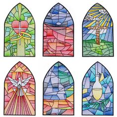 four stained glass windows with different designs