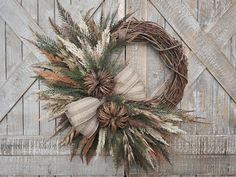 a wreath on the side of a wooden door