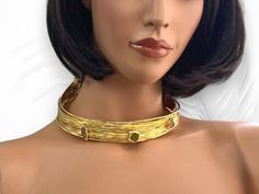 Immerse yourself in the timeless allure of ancient Egypt with our Handmade Gold Plated Open Choker Collar Necklace. Inspired by the opulence of this ancient civilization, this stunning piece combines modern design with traditional elements for a truly captivating accessory. Crafted with meticulous attention to detail, this choker features vibrant colorful crystals that add a pop of color and sparkle to your ensemble. The open collar design enhances its contemporary appeal, making it a statement Handmade Gold Goddess Necklaces, Handmade Gold Goddess Necklace, Handmade Goddess Style Gold Necklace, Artisan Gold Choker Necklace, Adjustable Gold Artisan Choker, Adjustable Artisan Gold Choker, Artisan Adjustable Gold Choker, Gold Gemstone Choker, Elegant Adjustable Choker For Ceremonial Occasions