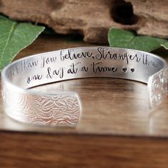 "Take a LOOK at our Website: ANNIEREH.com Inspirational Bracelet, You are braver than you Believe, Stronger than you seem, One Day at a Time, Secret Message Cuff Bracelet Customize our secret message cuff bracelets with your favorite word/s, meaningful phrase, special saying, names of loved ones, grandchildren, dates and even coordinates for the place you met your partner or shared a special moment with someone. This Cuff shown above says You are Braver than you Believe, Stronger than you Seem, Adjustable Engraved Cuff Bracelet For Friendship, Inspirational Stamped Bracelets For Friendship, Meaningful Engraved Adjustable Bracelet, Adjustable Engraved Meaningful Bracelet, Adjustable Engraved Meaningful Bracelets, Adjustable Engraved Cuff Bracelet With Meaningful Style, Adjustable Engraved Cuff Bracelet Meaningful Style, Adjustable Engraved Cuff Bracelet, Inspirational Personalized Cuff Bracelet For Friendship