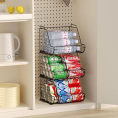 a stack of cans and cups on a shelf