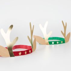 Why wear plain party hats when you, and your guests, can look reindeer remarkable in luxury velvet and gold foil? These fun antler headbands feature velvet elastic details, teamed with gold foil antlers and stars, and kraft paper ears. They're perfect for kids and adults. 8 Reindeer, Christmas Headwear, Whimsical Crafts, Christmas Party Hats, Red And Light Blue, Christmas Tree Embroidery, Chevron Mirror, Chevron Art, Antler Headband