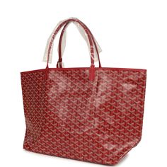 This Goyard St. Louis Tote GM bag is in red canvas with palladium hardware and has contrast white stitching, and a matching detachable button closure wallet The interior is lined with white canvas.Origin: FranceCondition: New and never worn (plastic on handles)Accompanied by: Goyard dustbag, felt, wallet and retail tagMeasurements: 15.7" x 13" x 7.8"; 8" shoulder strap Red Monogram Canvas Shoulder Bag, Red Monogram Canvas Bag With Dust Bag, Red Monogram Canvas Rectangular Bag, Red Rectangular Monogram Canvas Bag, Luxury Large Capacity Red Shoulder Bag, Designer Red Coated Canvas Bag, Designer Bags In Monogram Canvas With Silver-tone Hardware, Designer Bags With Silver-tone Hardware And Monogram Canvas, Red Monogram Canvas Shoulder Bag For Everyday Use