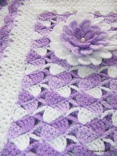 crocheted afghan with flowers and leaves on the side, along with two pictures of them