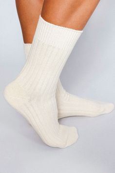 The Mere is our cashmere blend ankles featuring a light ribbing around the sock. Keep it classy in these premium blends. Size+ OSFA, W 6-10 Design+ 168 Needle+ Mid-weight+ Reinforced toe & heel+ Seamless toe+ Sweater knit+ Tall ankle Content + Care+ Premium Cashmere Blend+ Wash Cold/Dry Low+ Imported Cream Ribbed Winter Socks, Cream Ribbed Socks For Winter, Classic White Socks For Fall, White Classic Socks For Fall, Comfortable Cream Socks, Soft Classic Solid Color Socks, Classic Soft Solid Color Socks, Comfortable Cream Socks For Fall, Soft Cream Socks For Fall