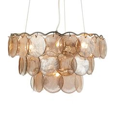 a chandelier with many lights hanging from it's sides and petals on the bottom