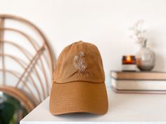 Brown Embroidered Curved Brim Baseball Cap, Brown Embroidered Baseball Cap With Curved Brim, Brown Embroidered Baseball Cap, Brown Curved Bill Hat For Gift, Embroidered Logo Cap As Gift, Brown Baseball Cap As A Gift, Curved Brim Hat With Embroidered Logo As Gift, Curved Brim Hat With Embroidered Logo For Gift, Brown Curved Brim Snapback Hat Gift