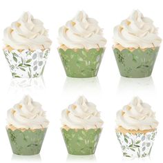 six cupcakes with white frosting and green leaves