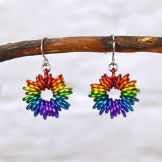 🔴 Add a burst of color to your outfit with these small handmade rainbow ombre Earrings.   🟠 Each earring is jam packed with links carefully arranged into a vibrant rainbow ombre.  🟡 Colors may vary slightly from earring to earring, but each will include about 11 colors. 🟢 Approximately 1.25" long from top of earwire 🔵 Aluminum with minimalist stainless steel earwire 🟣 Very lightweight; each earring only weighs about 1.9grams (less than the weight of a US dime) Feel free to message me to request a different color combination! Rainbow Dangle Metal Earrings, Hypoallergenic Rainbow Colored Metal Jewelry, Hypoallergenic Rainbow Metal Jewelry, Rainbow Metal Earrings With Ear Wire, Rainbow Metal Drop Earrings, Rainbow Metal Earrings, Ombre Earrings, Rainbow Ombre, Colored Earrings