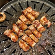 the food is being cooked on the grill and ready to be eaten by someone else