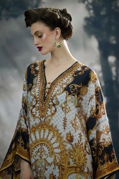 Black and gold kimono sleeves kaftan with all over royal garden print and beaded embellishments on the neckline. - Aza Fashions Gold Kimono, Rajdeep Ranawat, Kaftan For Women, Black Kaftan, Beaded Embellishments, Royal Garden, Kimono Sleeves, Garden Print, Satin Color