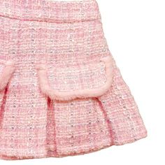 This pleated pink skirt offers effortless sophistication with its unique blend of textures and a stylish fur trim. Crafted from tweed, this skirt features an elastic waistband and a light pink lining for an added touch of color. A matching jacket is available to complete the ensemble! Shell: 20% wool, 40% acrylic, 40% polyester Lining: 100% polyester Pleated Pink Skirt, Hair Clip Holder, Pink Clothes, Pink Tweed, Pink Fur, Tie Headband, Tweed Skirt, Coin Bag, Pink Skirt