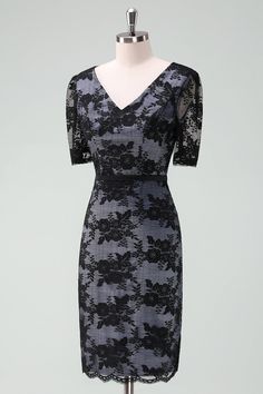 a black and grey dress on a mannequin