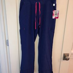 Adorable Women's Smitten Straight Leg Cargo Pants New With Tags Sz Psm 90% Poly And 10% Spandex In A Beautiful Purple With Bright Fuschia Pink Accents All Measurements Taken Across In Inches Waist: 15 Rise: 10 Inseam: 29 Leg Opening: 8.75 Questions? Please Message Me From A Clean, Smoke Free Home Sporty Purple Loungewear Bottoms, Purple Activewear With Pockets For Sports, Purple Stretch Activewear With Pockets, Purple Cotton Athleisure Pants, Purple Relaxed Fit Sweatpants With Pockets, Purple Fitted Activewear With Pockets, Purple Full-length Cargo Pants With Pockets, Full Length Purple Cargo Pants With Pockets, Purple Full-length Cargo Pants