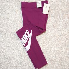 Brand New With Tags An Absolute Essential. These Women's Nike Leggings Offer A High-Rise Design And A Comfortable Stretch Waistband. Stretchy, Sweat-Wicking Fabric And A Nike Print Make These An Easy Choice For Everyday Wear. Product Features Soft And Stretchy Fabric Helps Wick Sweat Away From Your Body To Help Keep You Feeling Cool And Dry Throughout The Day Printed Graphic At The Calf Lets You Rep The Brand In Style Sporty Fitted Cotton Leggings, Nike Fitted Spring Activewear, Nike Fitted Activewear For Spring, Spring Nike Fitted Activewear, Fitted Nike Activewear For Spring, Sporty Leggings For Spring Streetwear, Fitted Sportswear Leggings For Spring, Spring Sportswear Fitted Leggings, Fitted Spring Sportswear Leggings