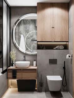 a bathroom with a sink, mirror and toilet in it's centerpieces