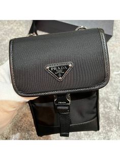 Gender: Women Brand: PRADA Product Name: Re-Nylon Saffiano Leather Mini Bag Black Bags Alora Code: 51269820 Color: black Composition: Polyamide, Calfskin Leather Origin: Italy Features: Removable Strap Adjustable Strap Flap closure Designer Style ID 2ZH109 2DMH F0002 Black Bag, Leather Mini, Beautiful Packaging, Exclusive Bag, New Bag, Mini Bag, Adjustable Straps, Women Brands, Calf Skin