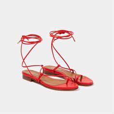 Gladiator Lipstick Red Nappa Sandal Elegant gladiator inspired lace-up flat thong sandal that ties at the ankle. Beautifully crafted in Italy with a touch of cushion to soften your step. Can't find your size? E-mail us at letschat@sclarandis.com Heel height: flat Made in: ItalyItalian leatherLeather liningLeather soleStyle number: 220303 Fit: whole sizes only – for ½ sizes order next size up. Note: this is a handcrafted product, some slight variation in color and material may occur. Red Flat Sandals, Tie Up Sandals, Red Flats, Red Sandals, Lipstick Red, Red Tie, Positano, Lace Up Flat, Thong Sandals