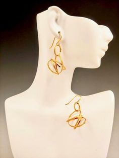 Large Vermeil Mobius Loop Earring Elegant Gold Spiral Wrap Earrings, Gold Wrap Earrings With A Modern Twist, Modern Twist Wrap Earrings As A Gift, Modern Twist Wrap Earrings For Gift, Elegant Gold Hammered Wrap Earrings, Loop Earrings, A Circle, Ear Wire, Jewelry Designs