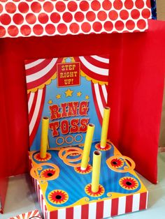 a red and blue circus tent with candles in it