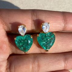 Paraiba Tourmaline Earrings features semi precious green stone and cz diamonds in heart shape. Ideal to pair with your design outfits and bridal wedding gown. These LUXURY Statement Green Pariba Tourmaline Earrings surely elevate your look. Perfect Gift For her. *𝐏𝐑𝐎𝐃𝐔𝐂𝐓 𝐃𝐄𝐓𝐀𝐈𝐋* * 𝐌𝐚𝐭𝐞𝐫𝐢𝐚𝐥: Brass * 𝐏𝐥𝐚𝐭𝐢𝐧𝐠: White Rhodium Plated * 𝐒𝐭𝐨𝐧𝐞: AAA-quality CZ yellow diamond & Paraiba Tourmaline. 𝐕𝐢𝐬𝐢𝐭 𝐎𝐮𝐫 𝐅𝐀𝐐𝐬 𝐟𝐨𝐫 𝐒𝐡𝐢𝐩𝐩𝐢𝐧𝐠 𝐏𝐨𝐥𝐢𝐜𝐢𝐞𝐬 𝐚𝐧𝐝 ? Luxury Unique Tourmaline Jewelry, Elegant Green Heart Cut Earrings, Green Heart-shaped Jewelry For Anniversary, Elegant Green Heart Earrings For Gift, Green Heart-shaped Anniversary Jewelry, Heart Cut Gemstone Earrings For Wedding, Green Double Heart Jewelry For Anniversary, Wedding Heart Cut Gemstone Earrings, Formal Green Heart-shaped Earrings