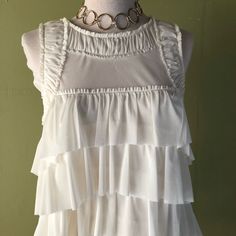 Express Sleeveless White Blouse Nwot New Without Tags. Never Worn. Fitted Sleeveless Tank Top With Ruffles, White Ruffled Tank Top For Party, Chic Flowy Sleeveless Blouse Tank Top, Chic Flowy Sleeveless Tank Top, Ruffled Sleeveless Party Tank Top, Flowy Sleeveless Blouse For Party, Flowy Sleeveless Party Blouse, Sleeveless White Blouse For Night Out, White Sleeveless Blouse For Night Out