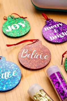 glitter ornament ornaments on a wooden table