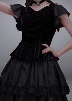 Elevate your style with our Black A-line Gothic Velvet Dress Set. This luxurious piece features a delicate lace edge, perfect for a sophisticated Lolita costume party. Designed with a plus size fit, this dress offers both comfort and elegance. Step into the world of high fashion with our velvet dress set. Black A-line Dress With Ruffles, Elegant Sleeveless Mini Dress For Halloween, Fitted A-line Corset Dress For Costume Party, Black A-line Mini Dress For Costume Party, Black A-line Corset Dress For Formal Occasions, Halloween Evening Mini Dress With Ruffles, Formal Corset Dress With Attached Cancan, Halloween Mini Dress With Ruffles For Evening, Gothic Corset Dress For Cocktail