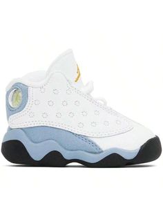 Nike Jordan 
Baby White & Blue Jordan 13 Retro Sneakers 
High-top grained leather and faux-suede sneakers in white and blue. 
. Quilted detailing throughout 
. Lace-up closure 
. Logo flag at vamp 
. Logo embroidered at padded tongue 
. Perforated detailing at tongue 
. Padded collar 
. Rubberized logo appliqué at outer side 
. Jersey lining 
. Treaded rubber sole 
Please note that this item may be shipped only within North America. 
Supplier color: White/Blue gray/Black/Yellow ochre 
Nike Jorda White Jordan Shoes For Light Sports With Rubber Sole, Jordan Sports Shoes With White Sole And Round Toe, Jordan Shoes For Light Sports With Synthetic Material, Jordan Shoes For Light Sports With Round Toe, White Jordan Shoes With Rubber Sole For Light Sports, Jordan Shoes With Laces For Light Sports Round Toe, Sporty Low-top Basketball Shoes With Studded Outsoles, Custom White Sneakers With Studded Outsoles For Sports, Sporty Basketball Shoes With Studded Rubber Outsoles