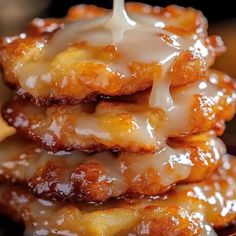 a stack of doughnuts with icing on top