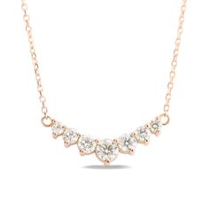 This timelessly gorgeous diamond necklace showcases brilliant white diamonds set in a lustrous 14k rose gold curved 7 stone pendant setting creating an eye-catching and chic look. The 7 diamond pendant hangs gorgeously from a solid 14k rose gold cable chain. The length of the gold chain can be adjusted to either 16" or 18" long to suit your style! This curved diamond necklace matches perfectly with our 7 stone diamond wedding bands and earrings. It can be made in your choice of white, rose, or y 14k Rose Gold Anniversary Necklaces, 14k Rose Gold Necklace For Anniversary, Unique Diamond Pendant, Round Diamond Necklace, Diamond Cluster Necklace, Gold Necklace Chain, Diamond Drop Necklace, Necklace With Name, Chain Necklace For Men