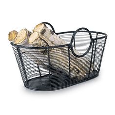 a wire basket with logs in it on a white background