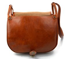 Women saddle bag handbag leather bag clutch hobo bag shoulder bag brown crossbody bag bag honey black made in Italy genuine leather Item details: Shoulder bag in genuine Italian leather with metal button closing. Materials: Genuine Italian hand-buffed calf leather. Best vegetable tanned leather making our handbags the most durable and weather resistant. Rigid construction Inside material: Lining the back of the natural leather Exteriors: Metal accessories Zip pocket Interior: 2 compartments Zip Cognac Leather Saddle Shoulder Bag With Leather Lining, Brown Saddle Bag With Detachable Strap, Cognac Saddle Bag With Removable Pouch, Cognac Saddle Bag In Soft Leather, Cognac Soft Leather Saddle Bag, Brown Saddle Flap Bag With Leather Lining, Cognac Saddle Bag With Leather Handles, Brown Saddle Shoulder Bag With Removable Pouch, Cognac Saddle Bag With Leather Lining