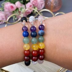 Since each copy is unique you will receive bracelet like as shown in the picture, but it may differ slightly. The bracelet will be packaged beautifully as a gift. Bead size: 8mm Lenght:16-20cm Basic base for bracelet: Lava, Rose Quartz or Howlite. 7 chakra stones: Clear Quartz, Amethyst, Lazurite, Aventurine, Citrine, Carnelian, Jasper. Introducing our exquisite 7 Chakras Natural Stones Bracelets, a harmonious fusion of beauty and holistic energy. Crafted with love and care, these bracelets are designed to align your chakras and enhance your overall well-being while adding a touch of elegance to your style. Each bracelet is meticulously handcrafted using an array of genuine natural stones, carefully chosen to represent and balance the seven energy centers of your body - the chakras. These Holistic Crystal Bracelet With Round Beads As Gift, Spiritual Rainbow Stretch Bracelet As Gift, Rainbow Natural Stones Beaded Bracelet As Gift, Rainbow Stretch Bracelet As A Gift, Rainbow Beaded Jewelry As A Gift, Rainbow Crystal Bracelet With Natural Stones For Healing, Spiritual Rainbow Beaded Bracelets Gift, Spiritual Rainbow Stretch Bracelet Gift, Rainbow Jewelry With 8mm Beads For Gift