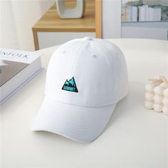 You will find that this baseball cap is a high quality, stylish cap made with high quality materials and is designed to be stylish and comfortable. Trendy Snapback Hat With Curved Visor For Sports, Casual Breathable Snapback Dad Hat, Casual Breathable Snapback Cap, Trendy Snapback Hat With Curved Bill For Sports, Trendy Snapback Dad Hat For Sports, Trendy Sports Baseball Cap With Curved Bill, White Hip Hop Baseball Cap For Outdoor, White Letter Print Baseball Cap For Streetwear, Trendy Curved Brim Baseball Cap For Sports