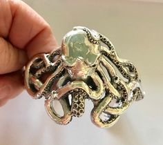 "Octopus Sterling Silver Cuff Bracelet. Fits an 8\"-8.5\" wrist. Heavy duty at 76 grams of 925 Silver. Great detail!" Octopus Bracelet, Chunky Cuff Bracelet, Silver Spoon Jewelry, Octopus Jewelry, Fork Bracelet, Rustic Bracelet, Cameo Bracelet, Spoon Jewelry, Vintage Inspired Jewelry