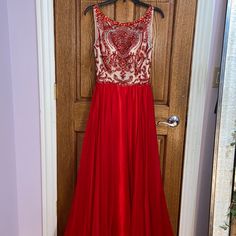 Never Been Worn With Tag On. Only One Bead Is Coming Off But There Is A Pouch With Extra Beads From The Manufacturer. It Is Lace But The Lace Has An Extra Layer So Your Skin Doesn’t Show! Red Sequined Ball Gown, Sleeveless Red Gown For Banquet, Red Sleeveless Gown For Banquet, Red Ball Gown For Holiday Season, Red Ball Gown For Holiday, Red Dress For Gala And Festive Occasions, Red Festive Gala Dress, Festive Red Dress For Gala, Festive Red Gala Dress