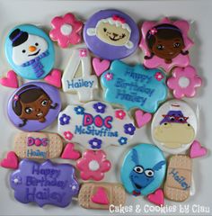 decorated cookies in the shape of characters for children's birthdays