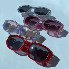 Fashion Bling Sunglasses. Hand Crystaled with High Quality Brilliant Crystals that really shine and sparkle! The same signature crystals I use to crystal luxury bags and shoes! Sunglass details: Adult, Unisex Rectangle Octagon Shape with Gold Medallion on the stem. Quality frames. Substantial thickness. Inspired Italian luxury high fashion sunglasses. Color Options: Silver crystals, Pink crystals, Red crystals, and soft blue (periwinkle) with color shifting AB crystals. The AB is the most limite Cheap Rave Sunglasses With Mirrored Lenses, Rhinestone Studded Sunglasses, Rave Sunglasses With Tinted Lenses, Luxury Elegant Shield Sunglasses For Party, Elegant Luxury Shield Sunglasses For Parties, Luxury Rhinestone Party Sunglasses, Luxury Chic Party Sunglasses, Cheap Rhinestone Party Sunglasses, Cheap Red Mirrored Sunglasses