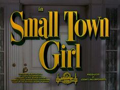 the title for small town girl is shown in an animated style, with yellow lettering