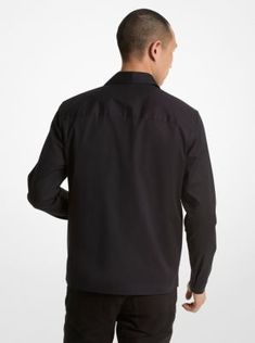 This jacket is designed to make any outfit look sharp, whether you wear it with jeans or tailored pants. The shirt-inspired style is crafted from stretch cotton in a minimalist profile that fastens with a sleek zip closure. A pair of patch pockets come in handy for keeping small items within reach. Wear it with a T-shirt or collared shirt depending on the occasion. Modern Tops With Concealed Placket And Spread Collar, Office Cotton Outerwear With Concealed Placket, Modern Formal Tops With Pockets, Modern Collared Tops With Welt Pockets, Modern Workwear Tops With Concealed Placket, Modern Tops With Concealed Placket For Workwear, Modern Tops For Workwear With Concealed Placket, Slim Fit Tops With Hidden Button For Business Casual, Modern Business Casual Tops With Lapel Collar