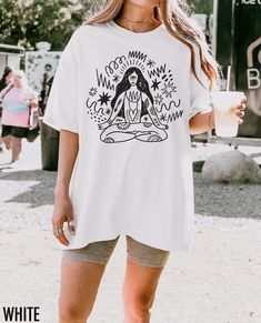 Channel your inner peace with this inspired yoga tee - featuring a hand drawn graphic of a woman with flowing shapes that celebrate movement, mindfulness, and wellness on and off the mat. We use professional quality DGT printing on all our apparel. Direct-to-garment, or DTG, is a high quality printing method that sprays ink directly onto the garment so there is no peeling or cracking. This fabulous graphic will be printed on a Comfort Colors Unisex T-Shirt. Please refer to the size charts in the images for the best fit.  Estimated Production Time: 1-5 days Estimated Shipping Time: 2-5 days 100% cotton shirt  Machine wash: cold  Non-chlorine: bleach as needed Tumble dry: low heat Iron, steam or dry: medium heat Do not dry clean White Short Sleeve Tops For Yoga, Relaxed Fit Yoga T-shirt With Letter Print, Casual White Top For Meditation, Relaxation Graphic Print Crew Neck Top, Graphic Print Crew Neck Tops For Relaxation, Crew Neck Top With Graphic Print For Relaxation, Graphic Print Yoga Top For Summer, Casual White Yoga Tops, White Athleisure Tops For Relaxation