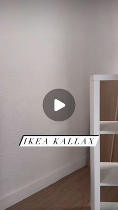 there is a white bookcase with the word ikea kalala on it and an arrow pointing up