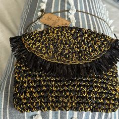 Made In India Long Antique Brass Chain Rectangular Woven Straw Bag, Gold Clutch Straw Bag For Beach, Gold Clutch Straw Bag For The Beach, Gold Straw Clutch Bag For The Beach, Gold Beach Bag With Chain Strap, Bohemian Woven Evening Bags, Gold Rectangular Beach Clutch, Gold Crossbody Shoulder Bag For Beach, Gold Shoulder Bag With Chain Strap For Beach